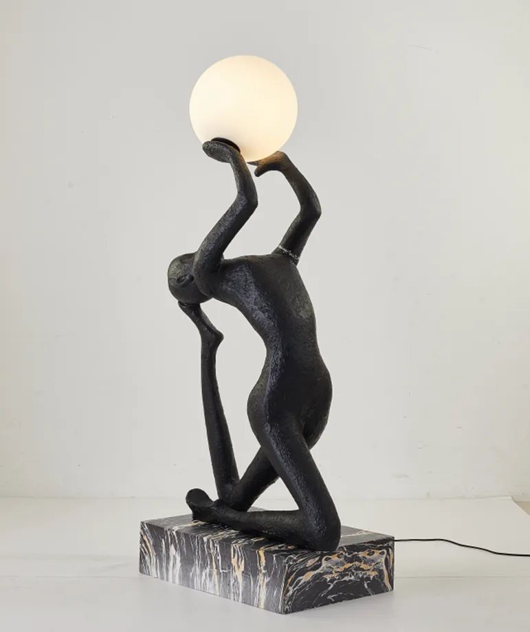 DESROCH LADY HOLDING BALL FLOOR LAMP