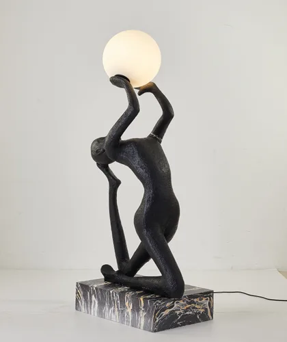 DESROCH LADY HOLDING BALL FLOOR LAMP