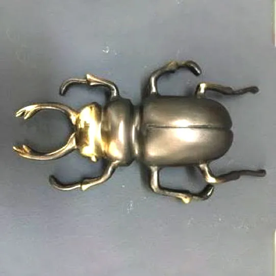 DESROCH DECOR DECORATIVE ORIGAMY BEETAL BRASS DECORATIVE OBJECT