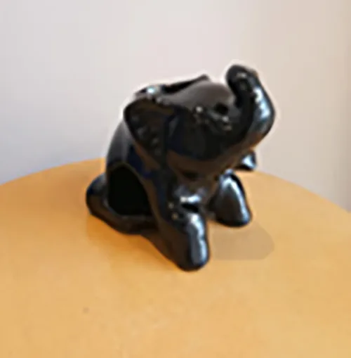 DESROCH DECOR METAL-GLOSSY BLACK DECORATIVE SCULPTURE CANDLE HOLDER
